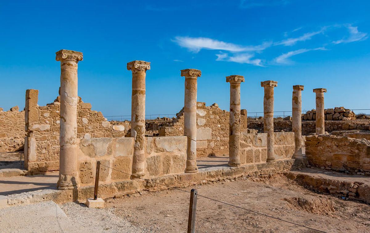 Roman columns against a blue sky in Paphos