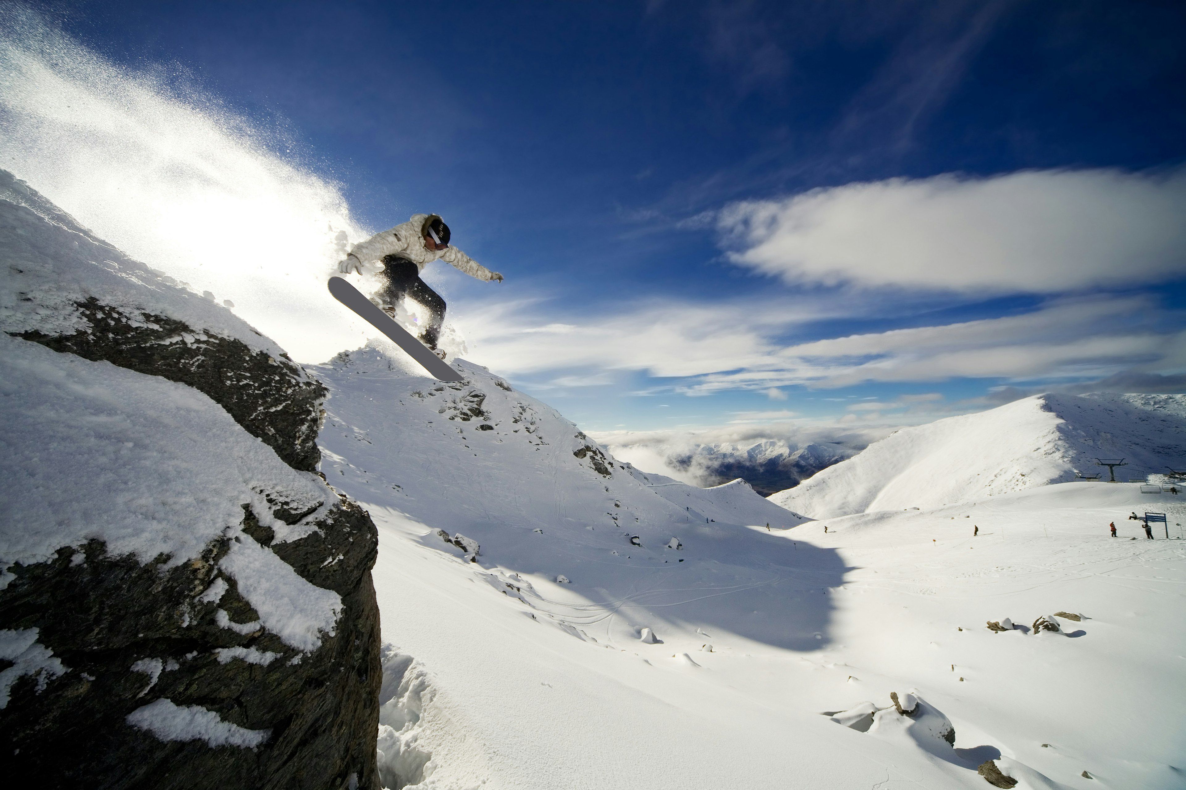 Snowboarder enjoying winter sports in New Zealand